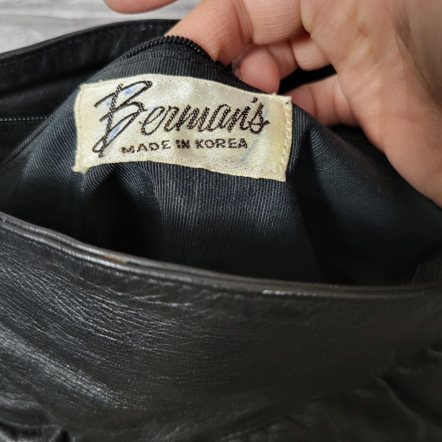 2 leather 1980s shoulder and clutch bags -- bundle