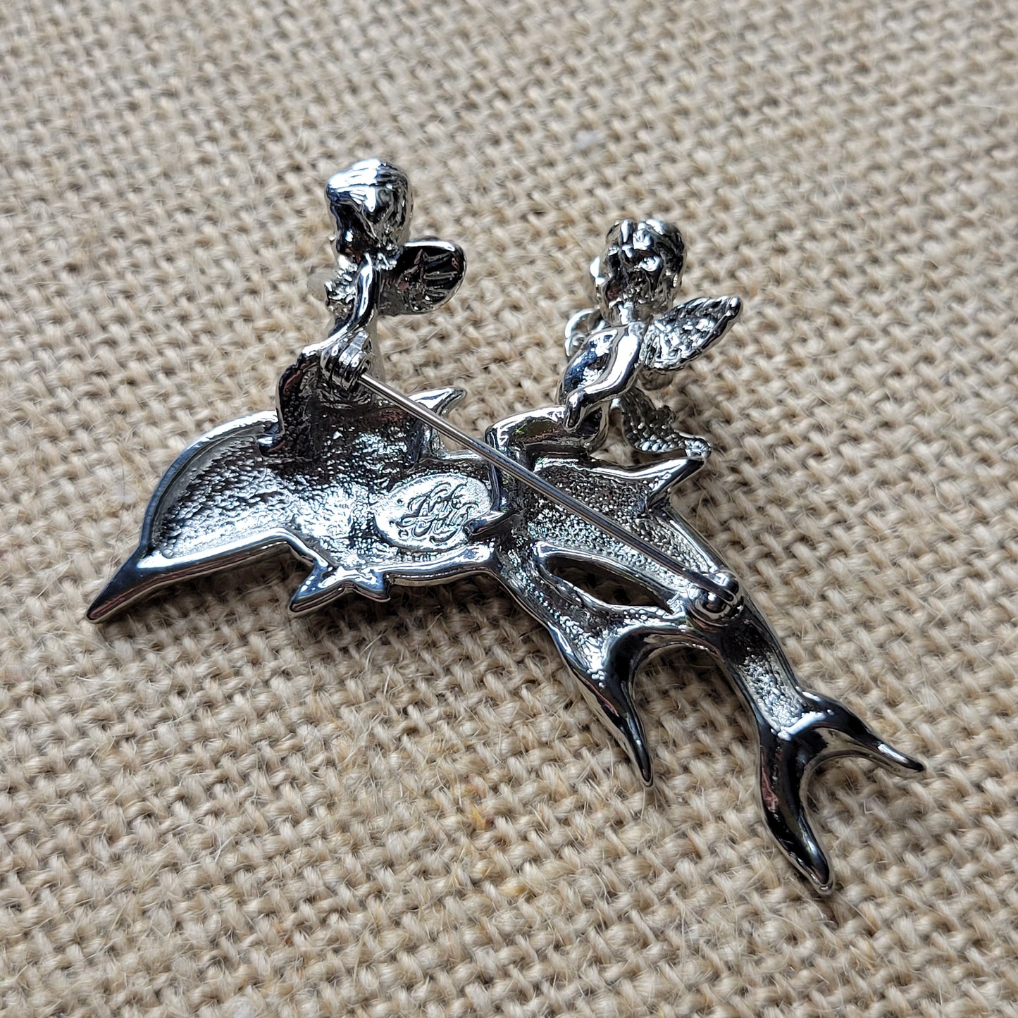 Kirk's Folly Cherubs riding dolphins brooch Water Babies silver tone