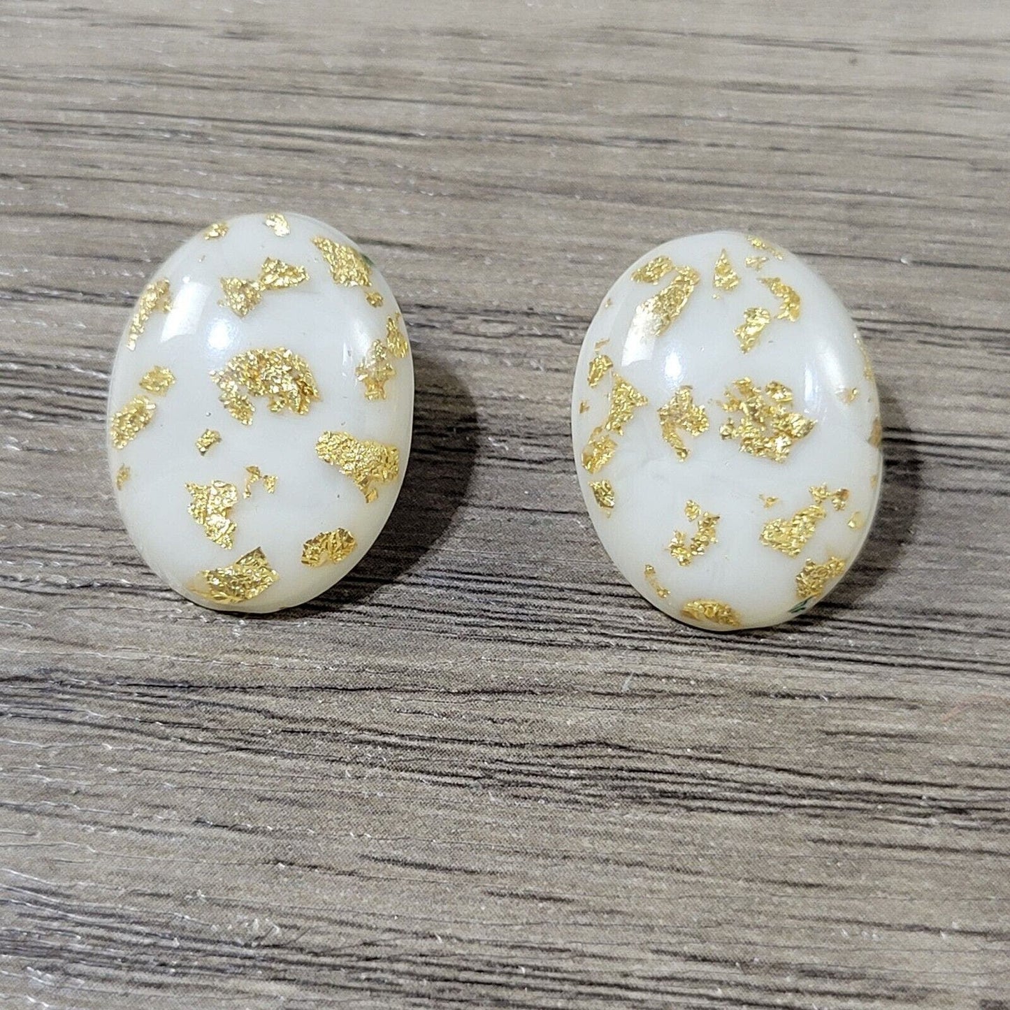 Vintage 1960s clip-on earrings gold flake confetti lucite ovals
