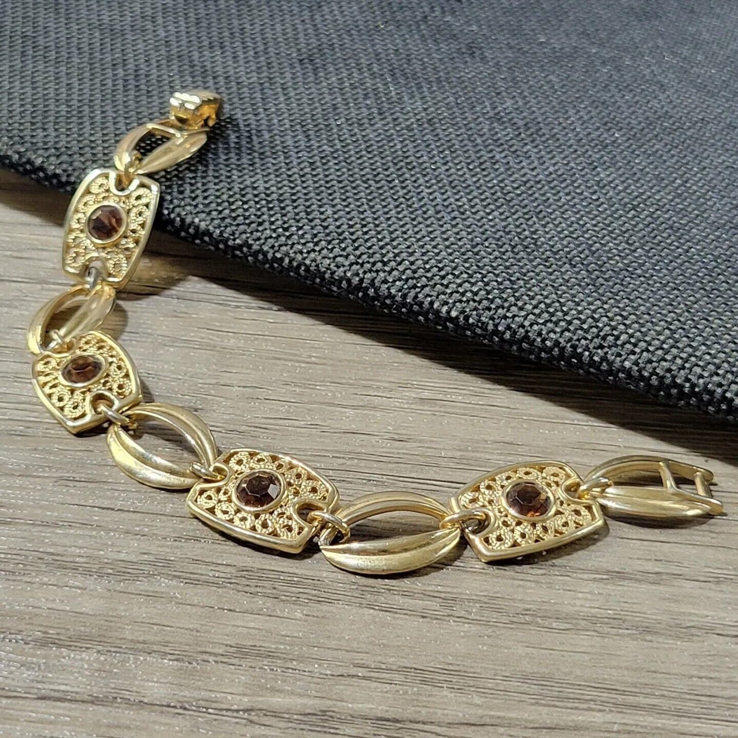 Sarah Coventry bracelet gold-tone and amber rhinestones links 1974 Butterscotch