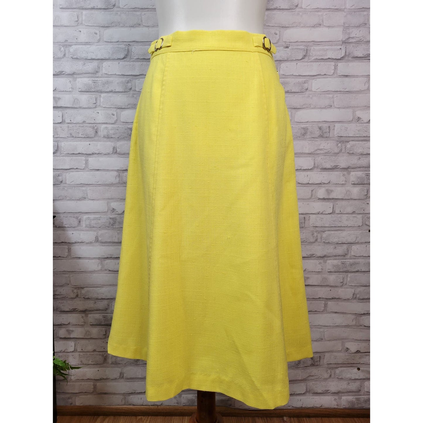 1960s A-line knee-length skirt sunny yellow cotton blend with buckle detail 28-inch waist