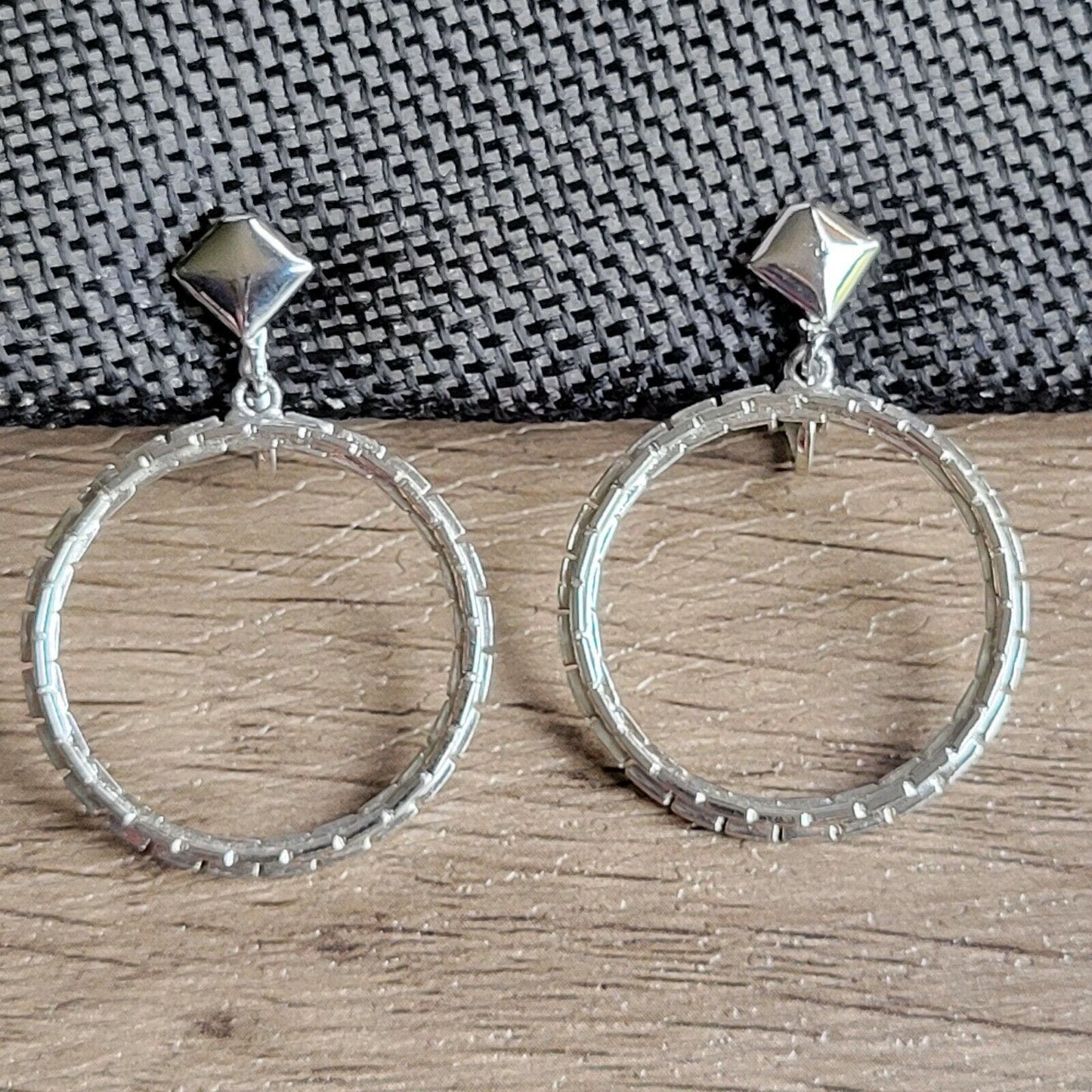 Vintage clip-on earrings mod silver-tone dangle chain front-facing Marilyn hoops