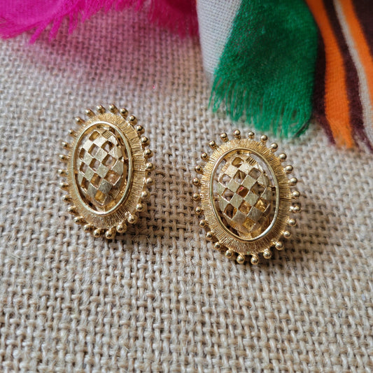 Monet gold-tone clip-on earrings harlequin diamond cut-outs in ovals, vintage 80s