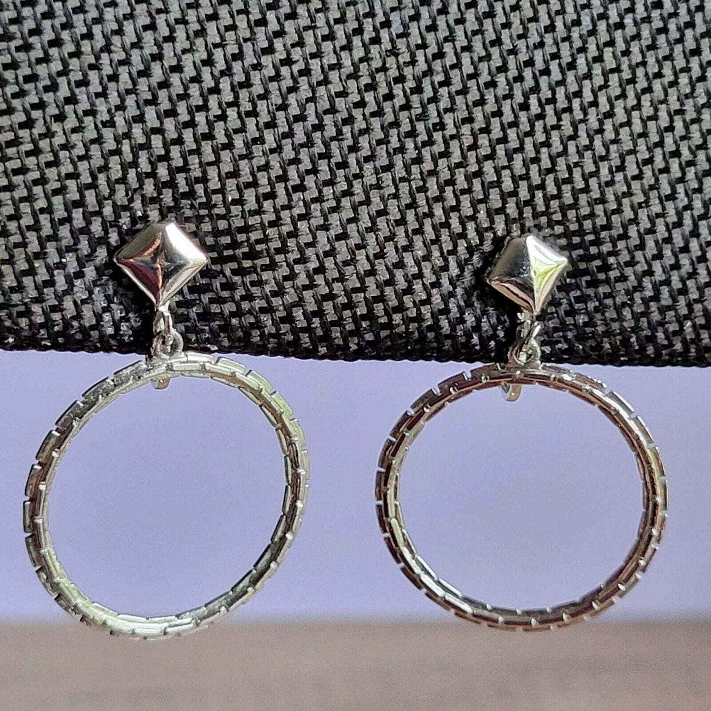 Vintage clip-on earrings mod silver-tone dangle chain front-facing Marilyn hoops