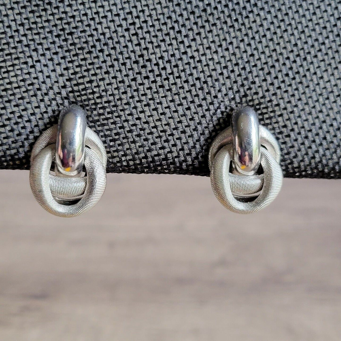 Vintage 1960s-70s clip-on earrings textured silver-tone loops adjustable