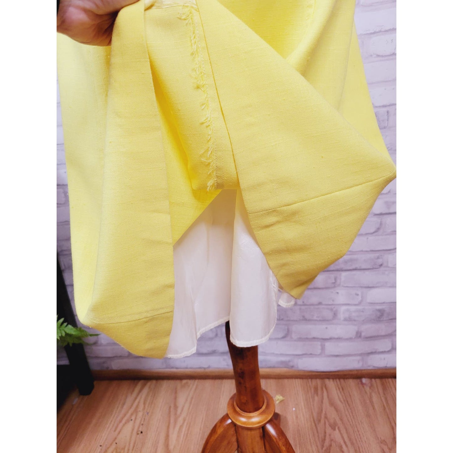 1960s A-line knee-length skirt sunny yellow cotton blend with buckle detail 28-inch waist