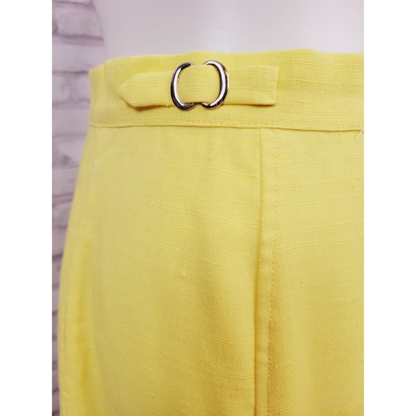 1960s A-line knee-length skirt sunny yellow cotton blend with buckle detail 28-inch waist